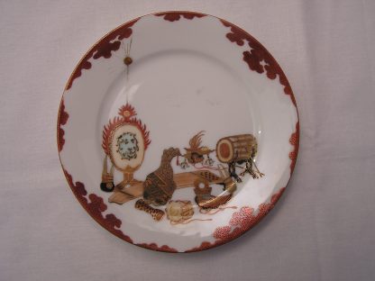 Plate with musical instruments marked "Imura", 1912-1926
