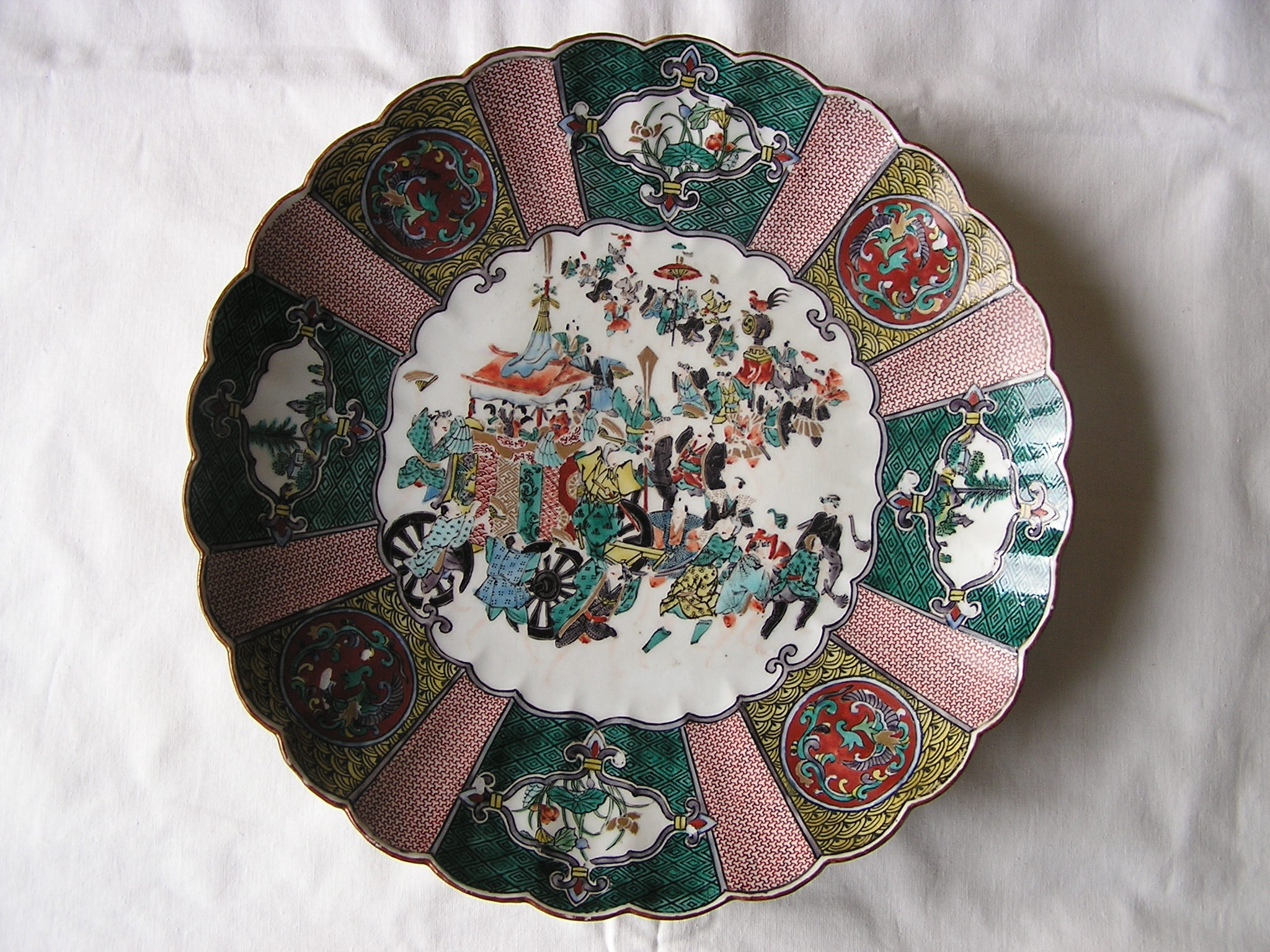 Kutani charger with festival, 1912-1926