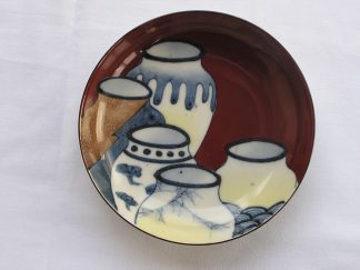 Hirado plate with jars in Nabeshima style (1850-1900)