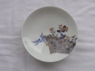 Small Koransha plate with fence and flowers, 1912-1926
