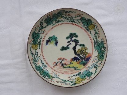 Kutani plate with landscape marked "fuku", 1900-1912