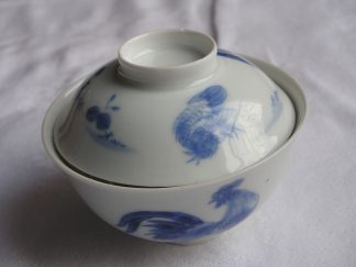 Lidded Hirado bowl ("chawan") with cockerel and hen, ca. 1800