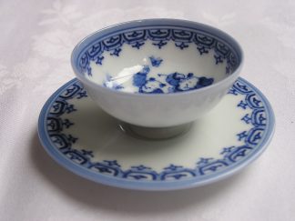 Hirado miniature cup and saucer with "karako" (Chinese children) marked "Sensui", 1868-1912