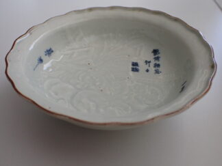 Bowl with goddess Kannon and karako in relief, 1750-1770