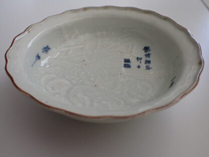 Bowl with goddess Kannon and karako in relief, 1750-1770