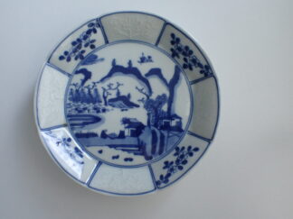 Small plate with flowers in relief and landscape, 1868-1912